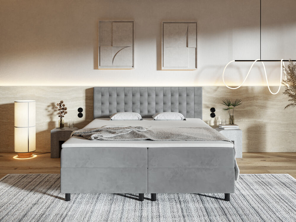 tapicerowane łóżko kontynentalne na nóżkach pilar